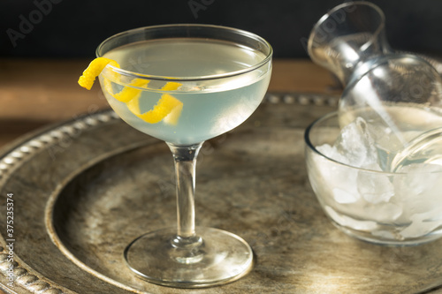 Refreshing Dry Martini with a Lemon Garnish