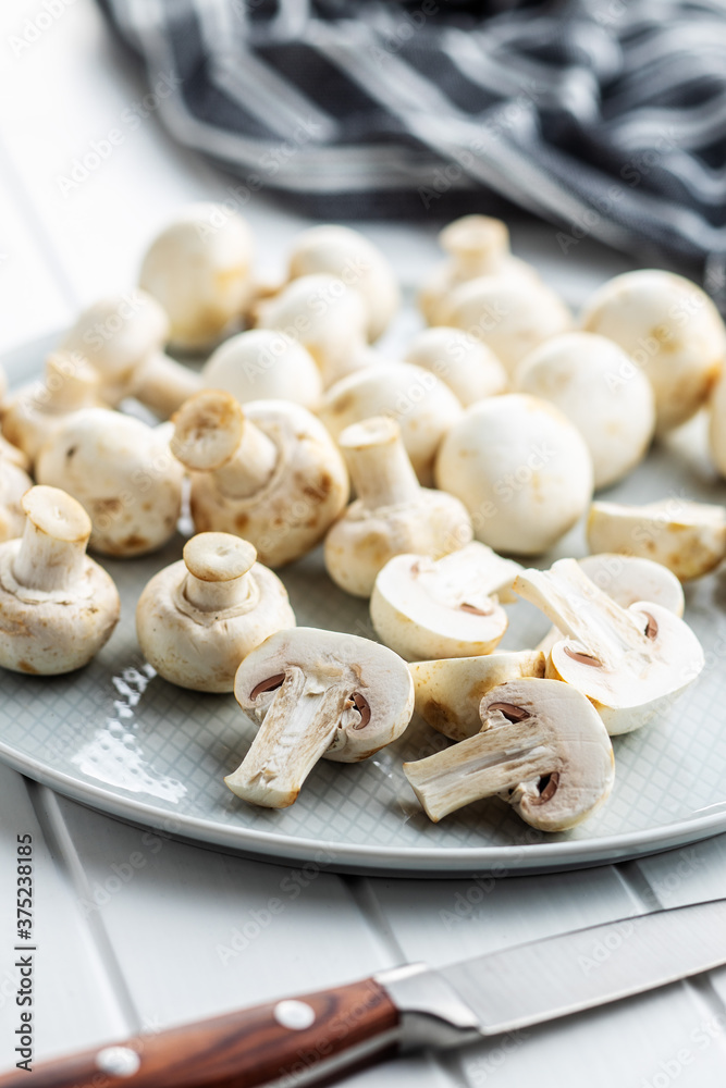 Fresh white champignon mushrooms. Fresh white champignon mushrooms.