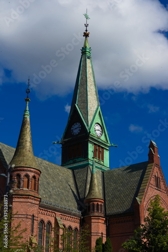 Oslo, Sagene, Norway - Aug 29th 2020: Sagene kirke urban church in Oslo with blue skies on a summers day. photo