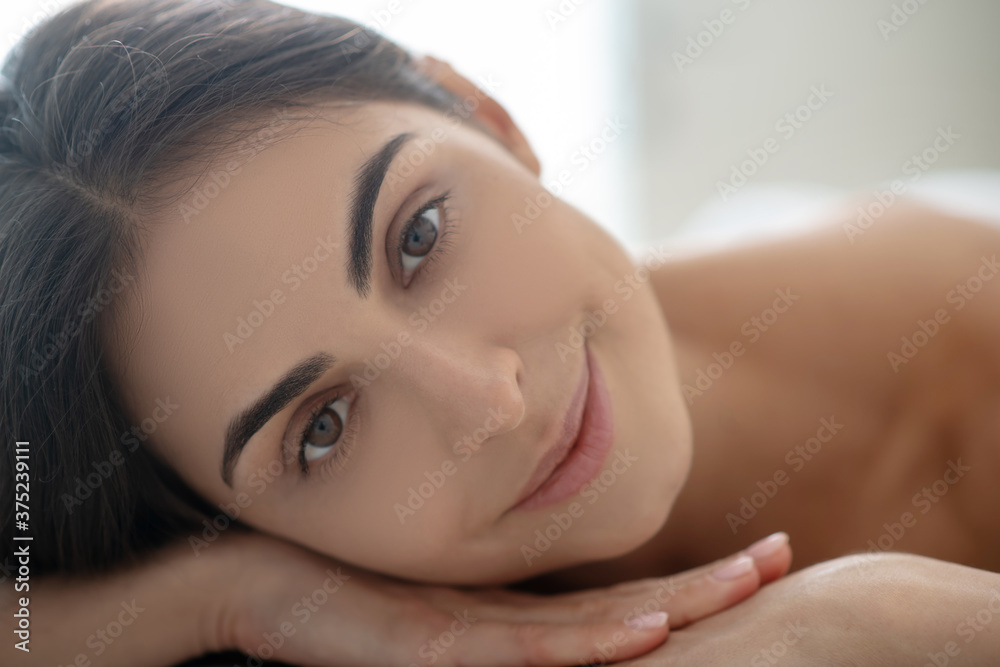 Close up picture of a smiling relaxed woman Close up picture of a smiling relaxed woman