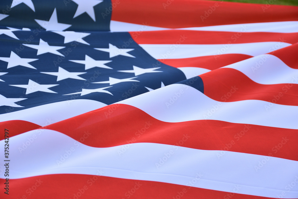 Obraz premium American flag on a football field, background, closeup