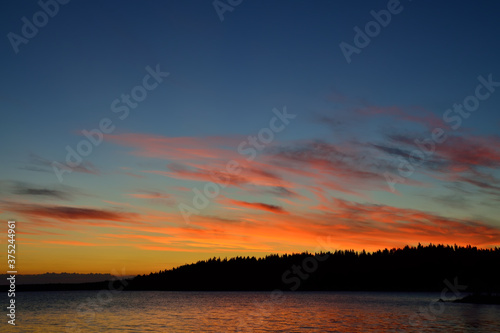 Beautiful fiery sunset. Lake Keret, Northern Karelia, Russia