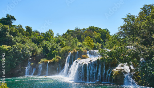 Krka national park in Croatia - lush green forest  waterfalls
