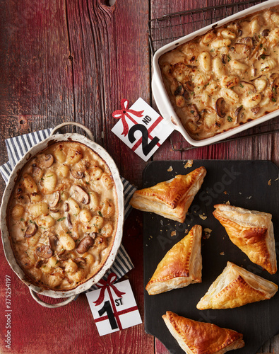 Overhead Festive Tourtiere Turnovers,  Mushroom and Onion Casseroles photo