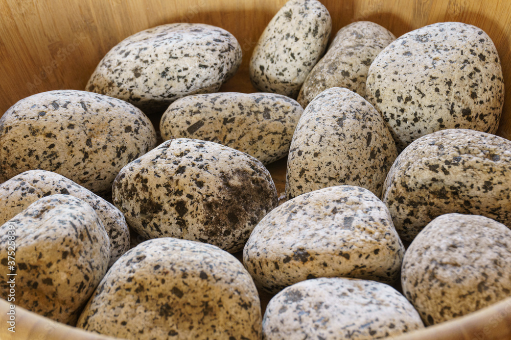 set of rocks and stones inside a decorative bowl set of rocks and stones inside a decorative bowl
