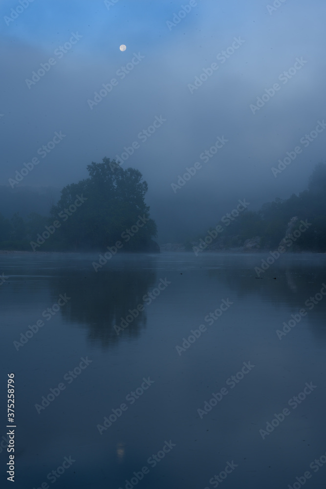 Waning Moon in the Clouds and Fog Over the Potomac River at Old Angler's Inn on a Summer Morning