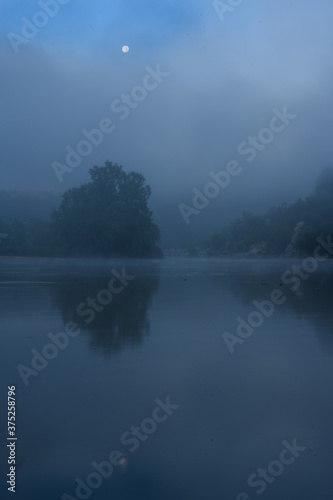 Waning Moon in the Clouds and Fog Over the Potomac River at Old Angler's Inn on a Summer Morning
