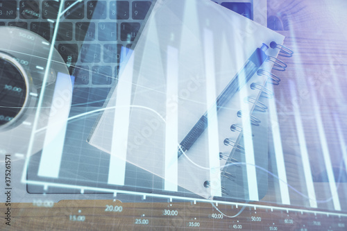 Multi exposure of forex chart drawing and work table top veiw. Concept of financial analysis.