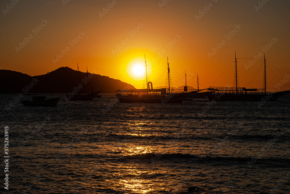 Sunset from Buzios with boats, Rio de janeiro. 