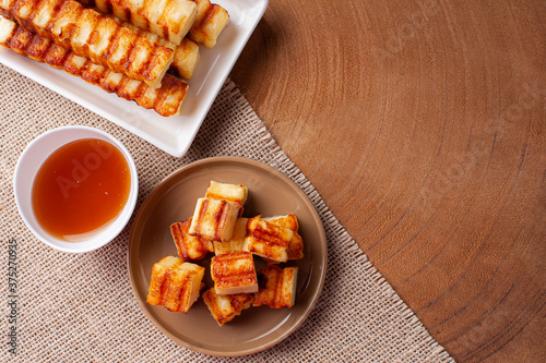 .Fried rennet cheese. Very traditional in Brazil accompanied by honey - Brazilain queijo coalho. Copy space photo