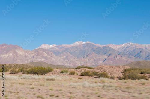 Coordillera de los Andres, Montañas en Cruce Argentina y Chile, día soleado, carretera en auto. photo