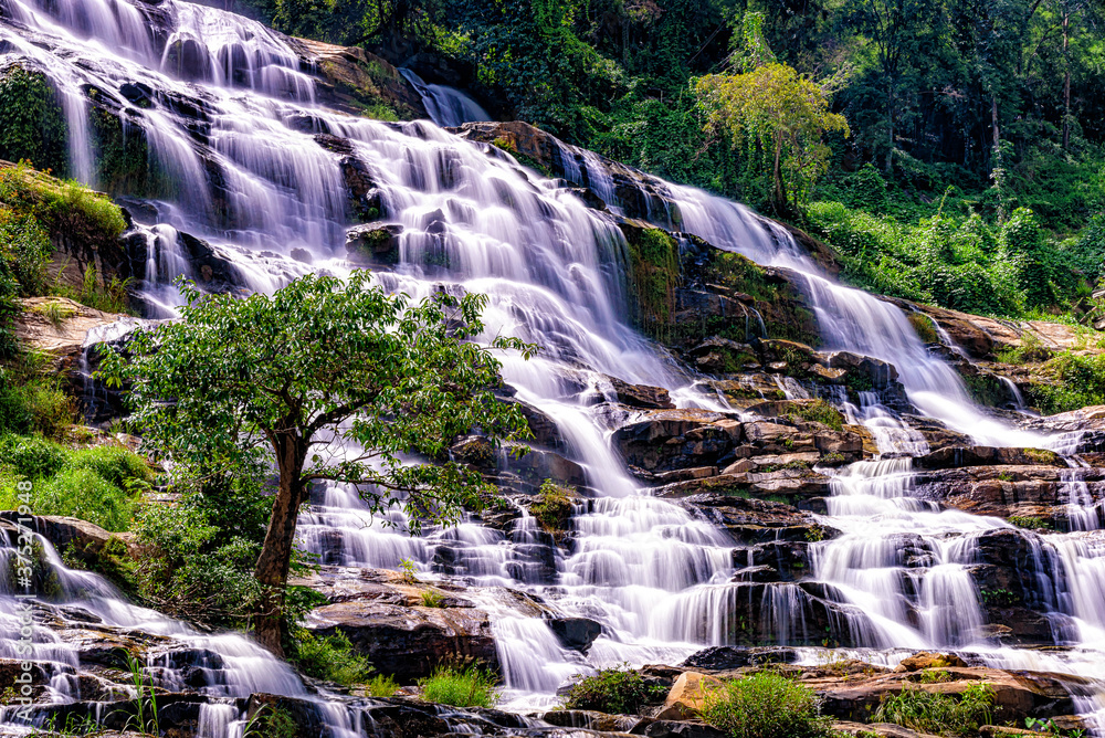 Fototapeta premium Mae Ya waterfall it beautiful most famous in Doi Inthanon National Park, Chiang mai, Thailand.