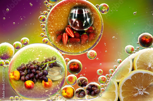 Fototapeta Naklejka Na Ścianę i Meble -  photo double exposure of fruit apples grapes lemon nectarine and oil drops in water for background