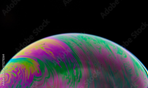 Brilliant Pink and Green Streaks on Bubble