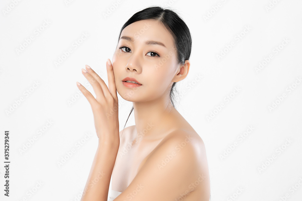 Beautiful Young asian Woman with Clean Fresh Skin, on white background, Face care, Facial treatment, Cosmetology, beauty and spa, Asian women portrait Beautiful Young asian Woman with Clean Fresh Skin, on white background, Face care, Facial treatment, Cosmetology, beauty and spa, Asian women portrait