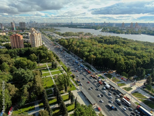 Aerial view cityscape of large streets. Car traffic on the highway in the big city