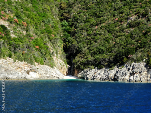 Panoramic view of Ionian island near Nydri village in Lefkada in Greece. Tourists visit Nydri for vacations for its natural mountainous and seascape, also choices of bars and restaurants. photo