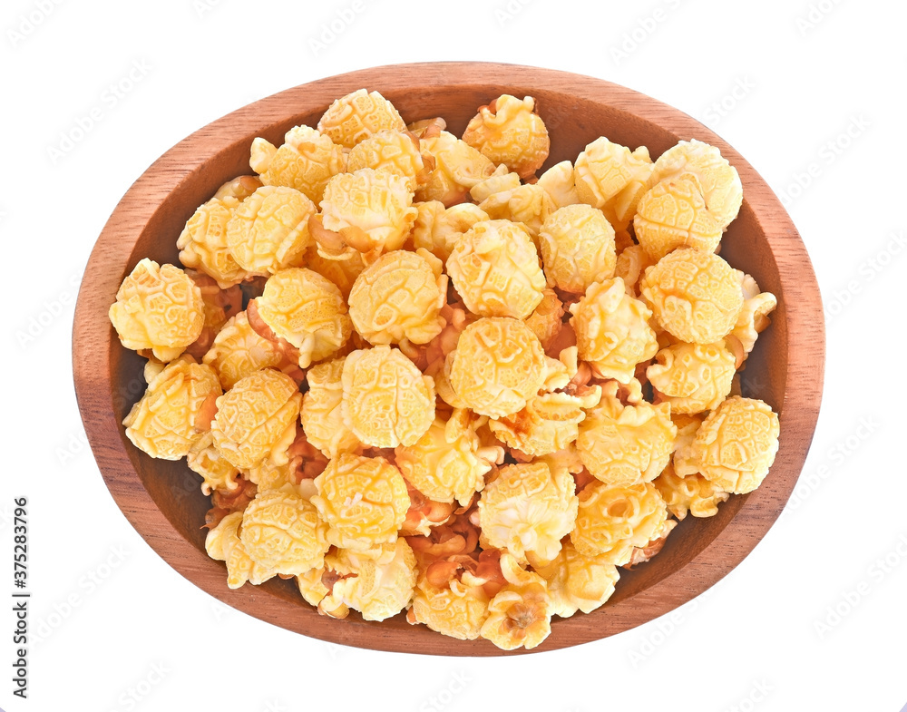 Popcorn in wooden bowl isolated wooden on white background. Popcorn in wooden bowl isolated wooden on white background.