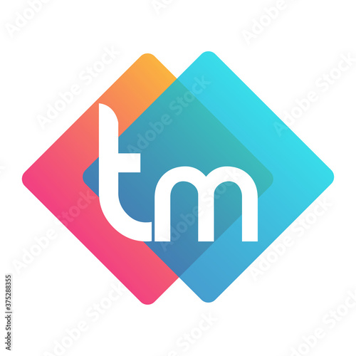 Letter TM logo with colorful geometric shape, letter combination logo design for creative industry, web, business and company. photo