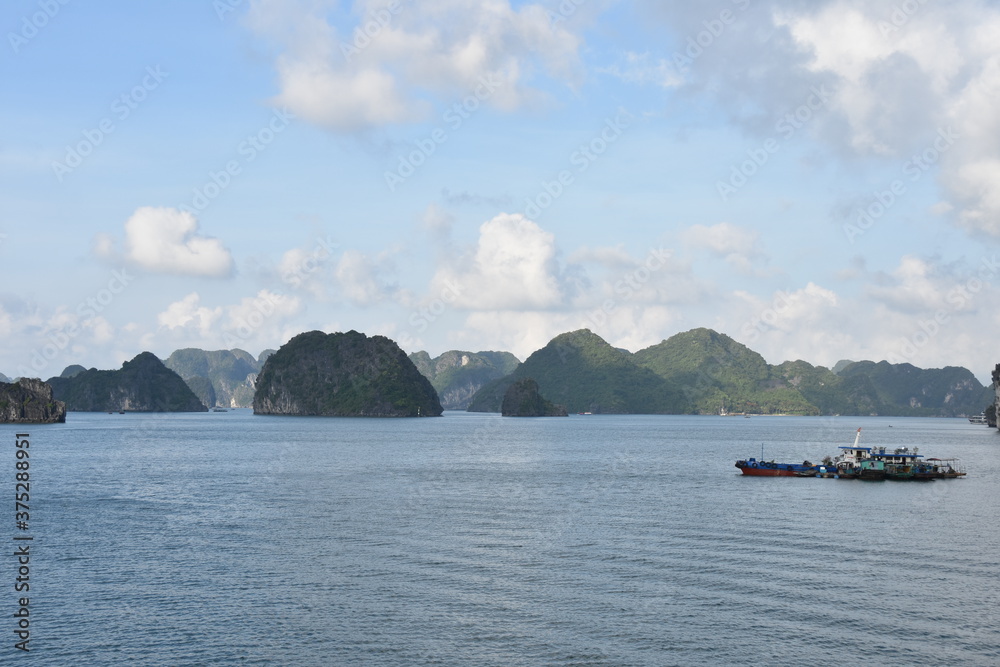 Lan Ha Bay Panorama with Boat Frame Right, Vietnam Lan Ha Bay Panorama with Boat Frame Right, Vietnam