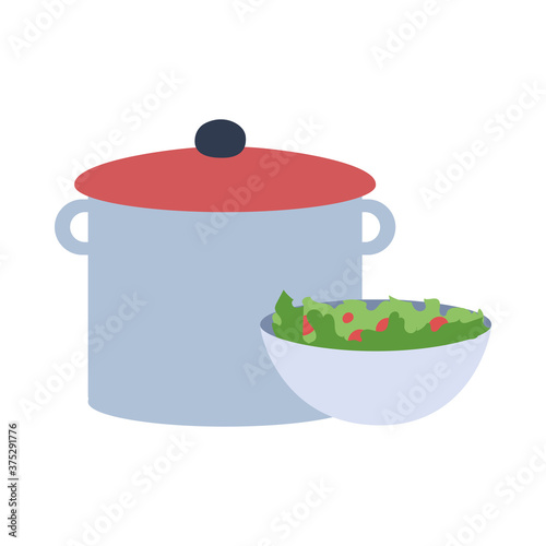 big silver pot with soup and a plat of salad