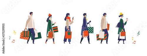 Masked people carrying shopping bags at Christmas. Man and woman taking part in seasonal sale at store, shop, mall on new normal lifestyle.