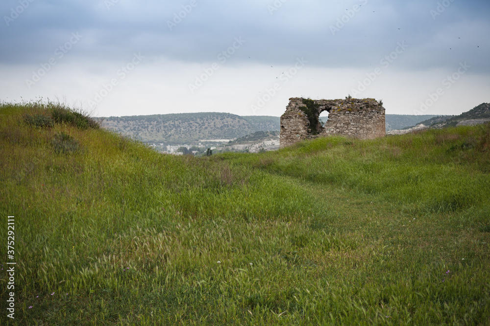 Landscape with ruins of the ancient fortress Calamita