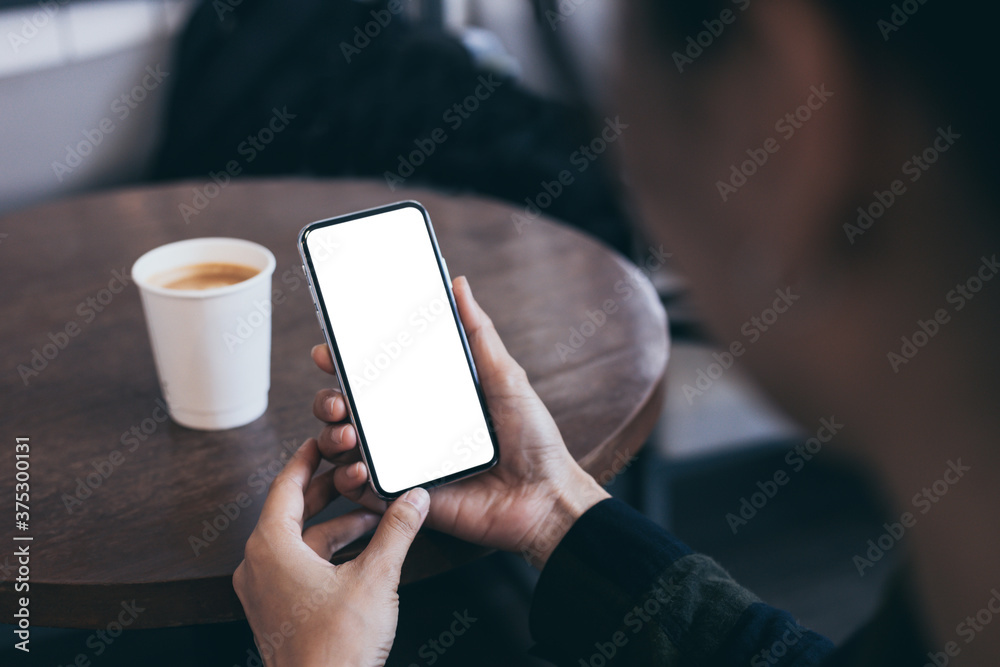 cell phone mockup blank white screen.woman hand holding texting using mobile on desk at coffee shop.background empty space for advertise.work people contact marketing business,technology cell phone mockup blank white screen.woman hand holding texting using mobile on desk at coffee shop.background empty space for advertise.work people contact marketing business,technology