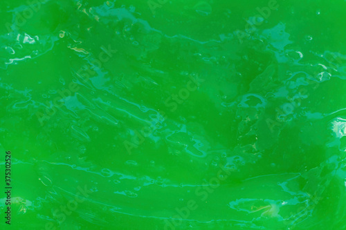 The texture of green slime. Design for halloween. The photo