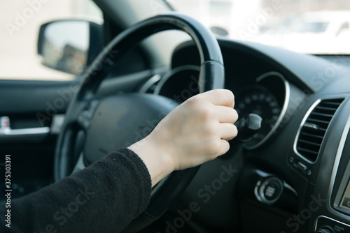 driving woman's hand