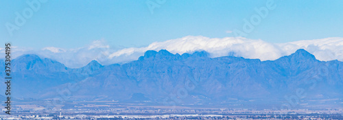 Panoramic view of Cape Town cityscape and mountains, South Africa.