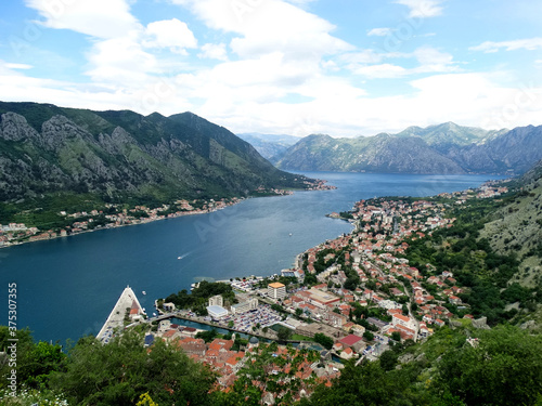 Aerial view of Kotor city in Kotor, Montenegro. Kotor is a coastal town in a secluded Gulf of Kotor, its preserved medieval old town is an UNESCO World Heritage Site. 