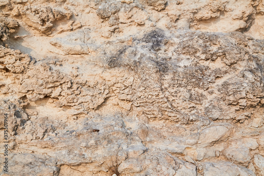 Rock climbing backdrop, copy space. Rock surface. Abstract nature texture. Beige mountain. Natural material background.