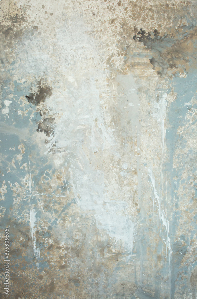 Light blue wall with abstract spots. Beautiful gray, white texture, abstract wall surface background, vintage surface texture with copy space, unusual mottled surface.