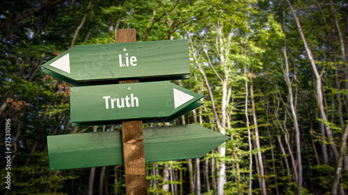 Fototapeta Naklejka Na Ścianę i Meble -  Street Sign to Truth versus Lie