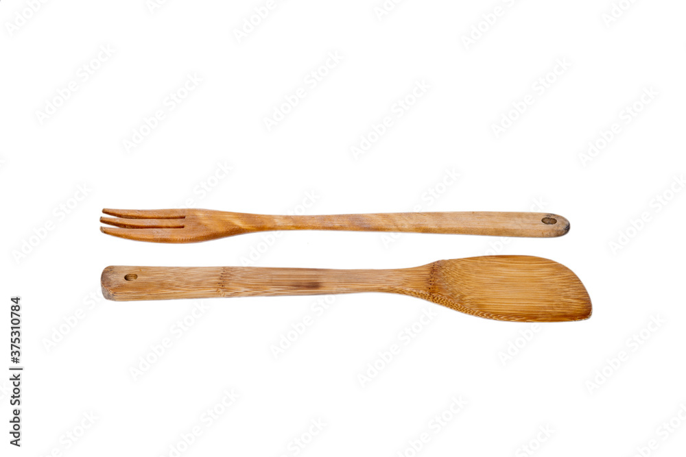 Wooden kitchen spatulas isolated on white background. Kitchenware Wooden kitchen spatulas isolated on white background. Kitchenware