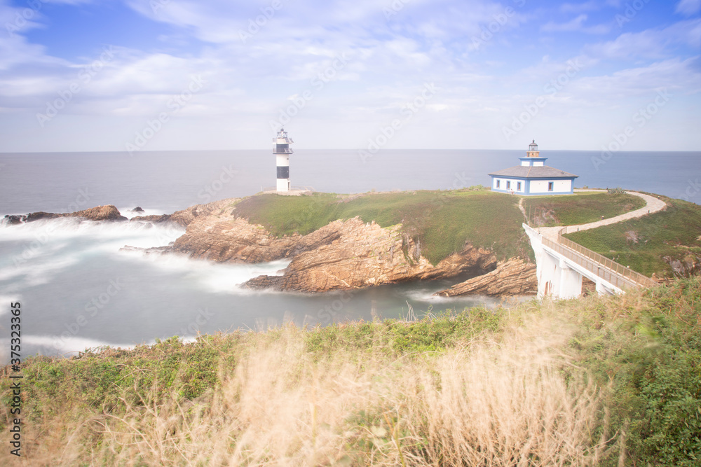 lighthouse in isla pancha, asturiass spain lighthouse in isla pancha, asturiass spain