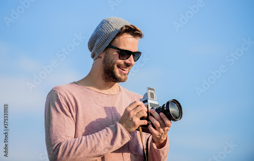 An image is Life. sexy man touristic reporter. photographer in glasses. travel with camera. male fashion style. looking trendy. macho man with camera. capture adventure. journalist