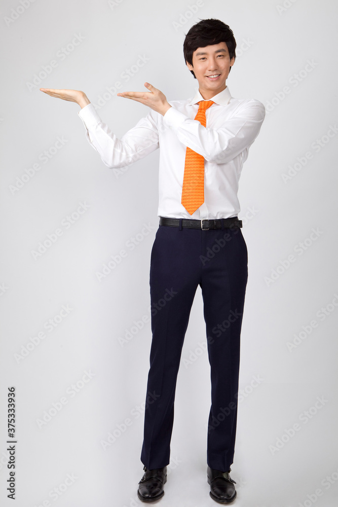young businessman presenting something with hands