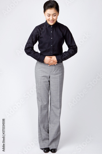 Fotografie young businesswoman giving a slight nod