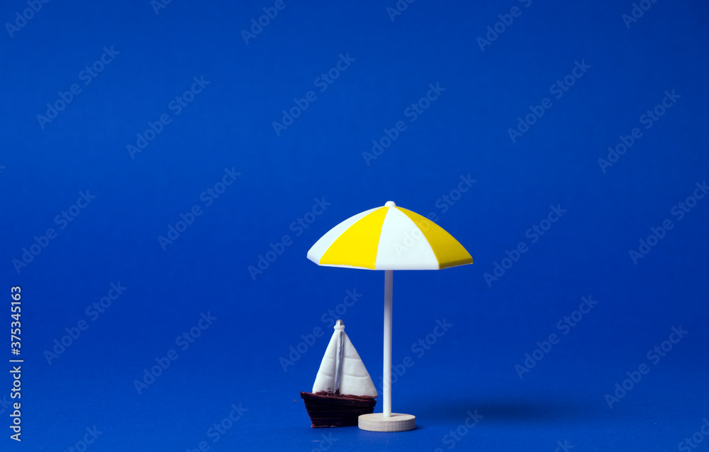 beach umbrella on the background of boats