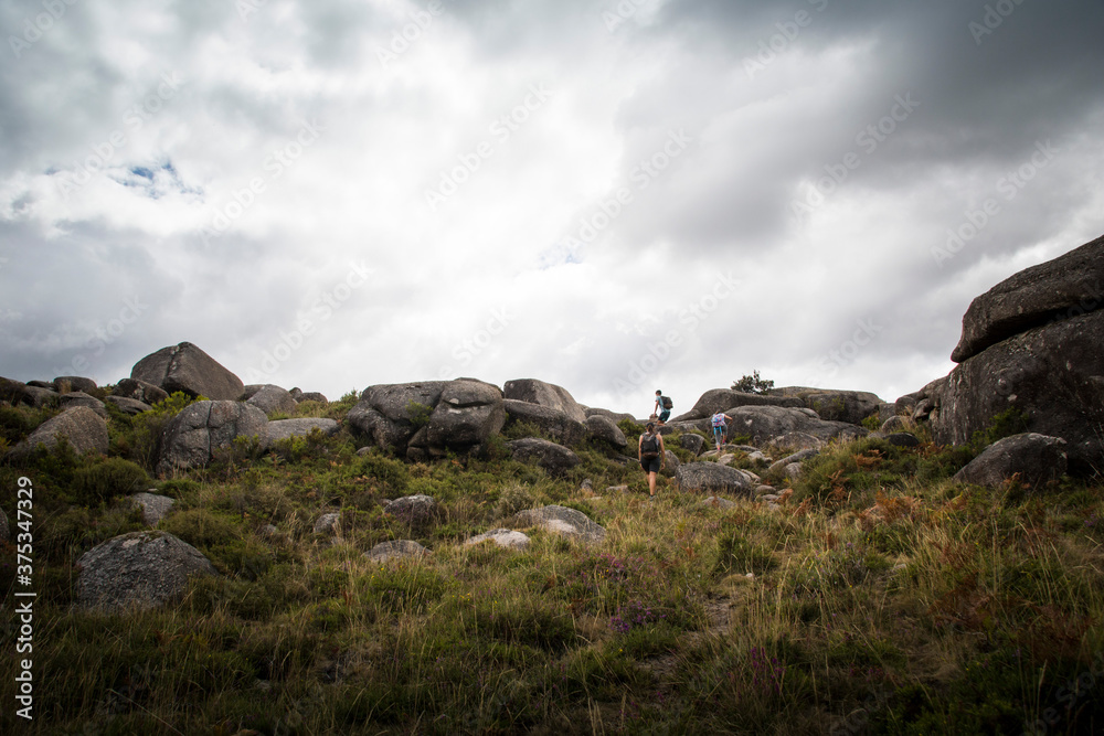 Hikers walking uphill