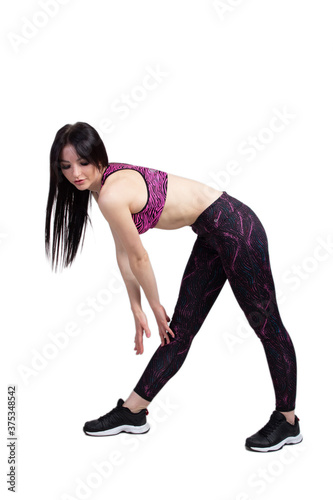 Sports fitness young woman has a slender figure. isolate on a white background