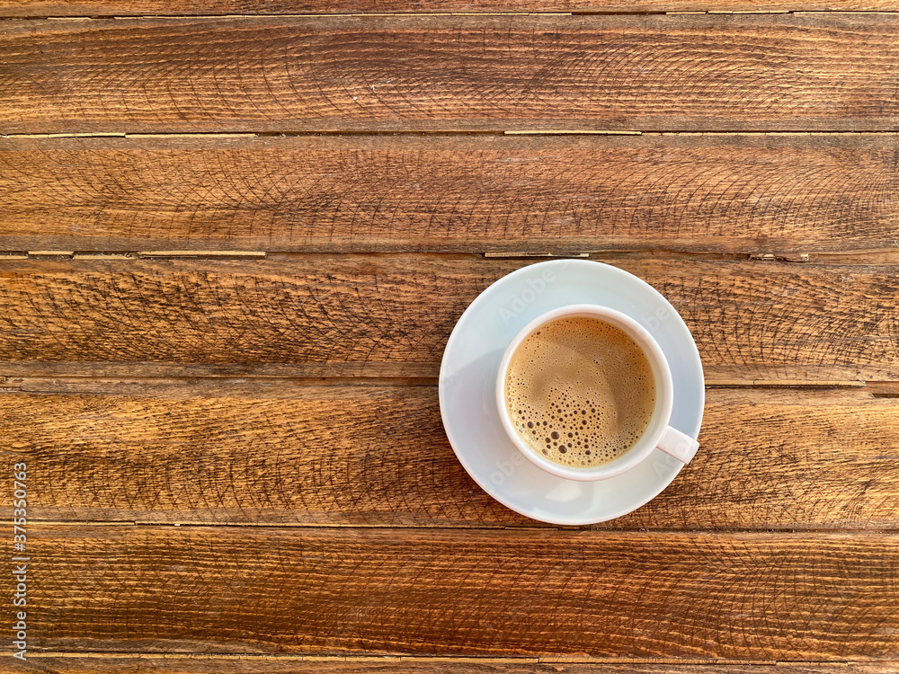Top view coffee on wooden table Top view coffee on wooden table