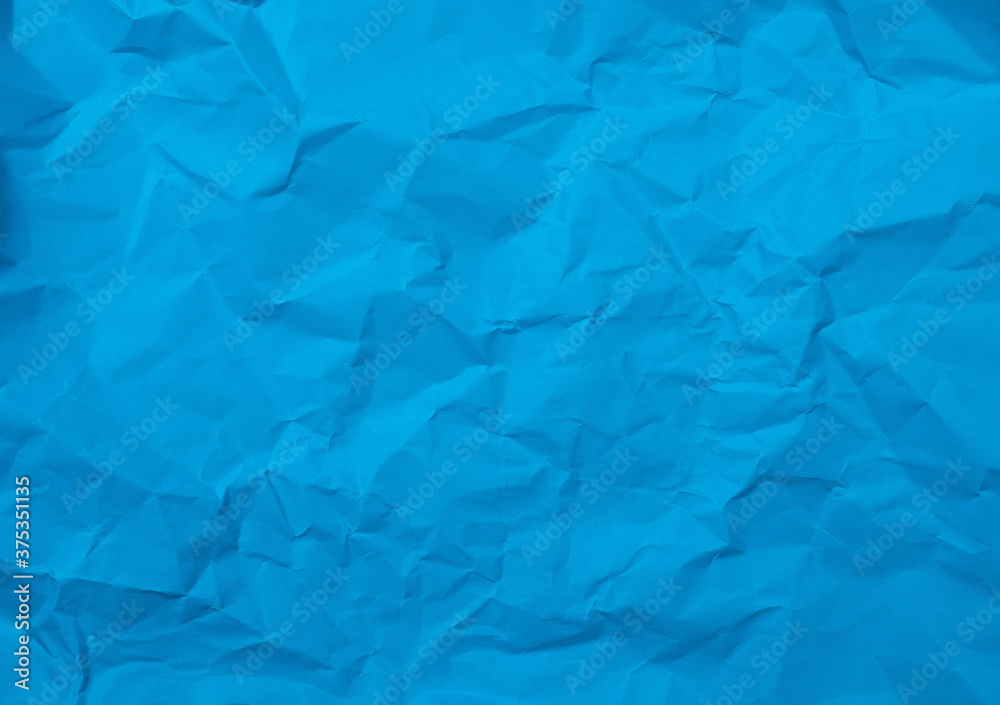 Obraz premium Crumpled blue color background texture