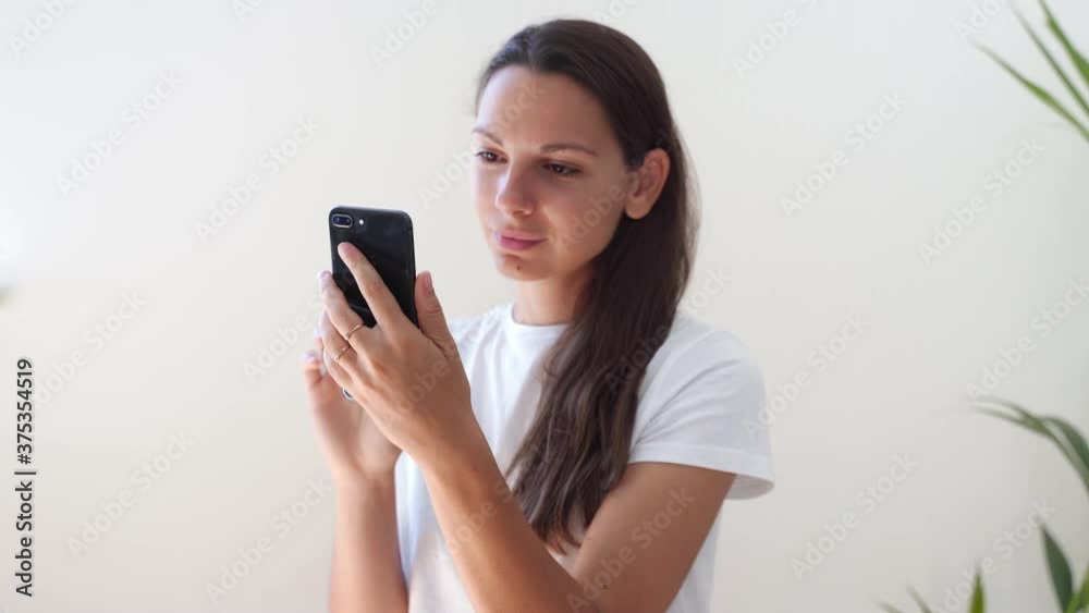 Young caucasian woman with phone. Censorship in internet. Young caucasian woman with phone. Censorship in internet.