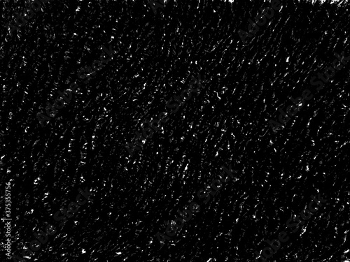 Confetti white particles glittering in dark black background