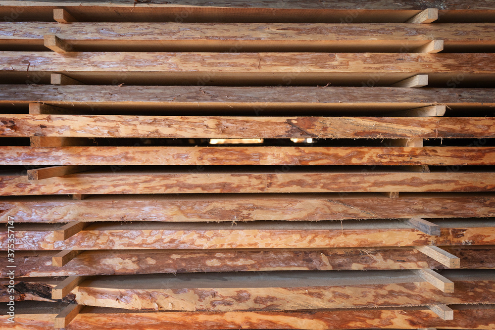 Stack of cut wooden boards