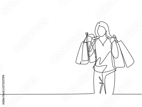 One single line drawing young happy beauty woman holding paper bags after buying dress, fashion, make up, cosmetic at mall. Commercial retail shopping concept. Continuous line draw design illustration