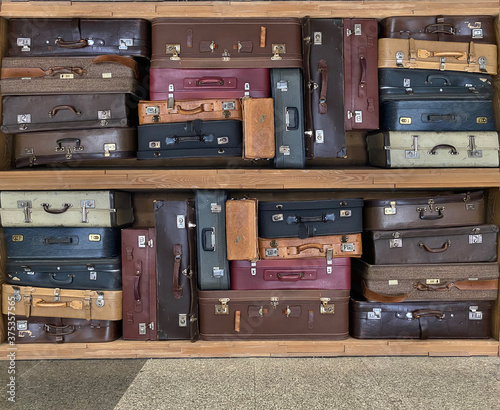 Suitcases standing on top of each other © bahadirbermekphoto